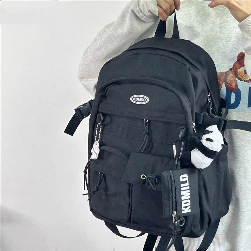 Korean version of versatile tooling style schoolbag female student large capacity Japanese bag travel backpack men and women backpack