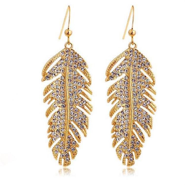 JMXD-Mode Persönlichkeit Feder Halsketten-Set Voller Diamant Blatt Ohrringe Temperament Kurze Schlüsselbein Kette