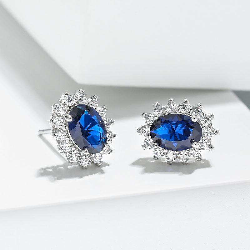 Zodiac Stone Gemstone Stud Earrings: Exaggerated Royal Blue Sapphire Sunflower Design In European and American Style.