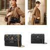 Sac bandoulière chaîne matelassé noir élégant Kurt Geiger avec un design tête d'aigle stylé