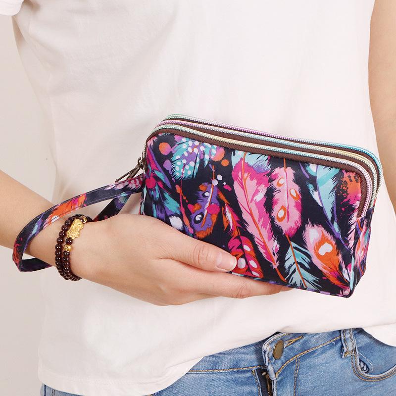 

Wholesale new women s long mobile phone wallet clutch bag women s fabric change bag women s clutch small clutch bag