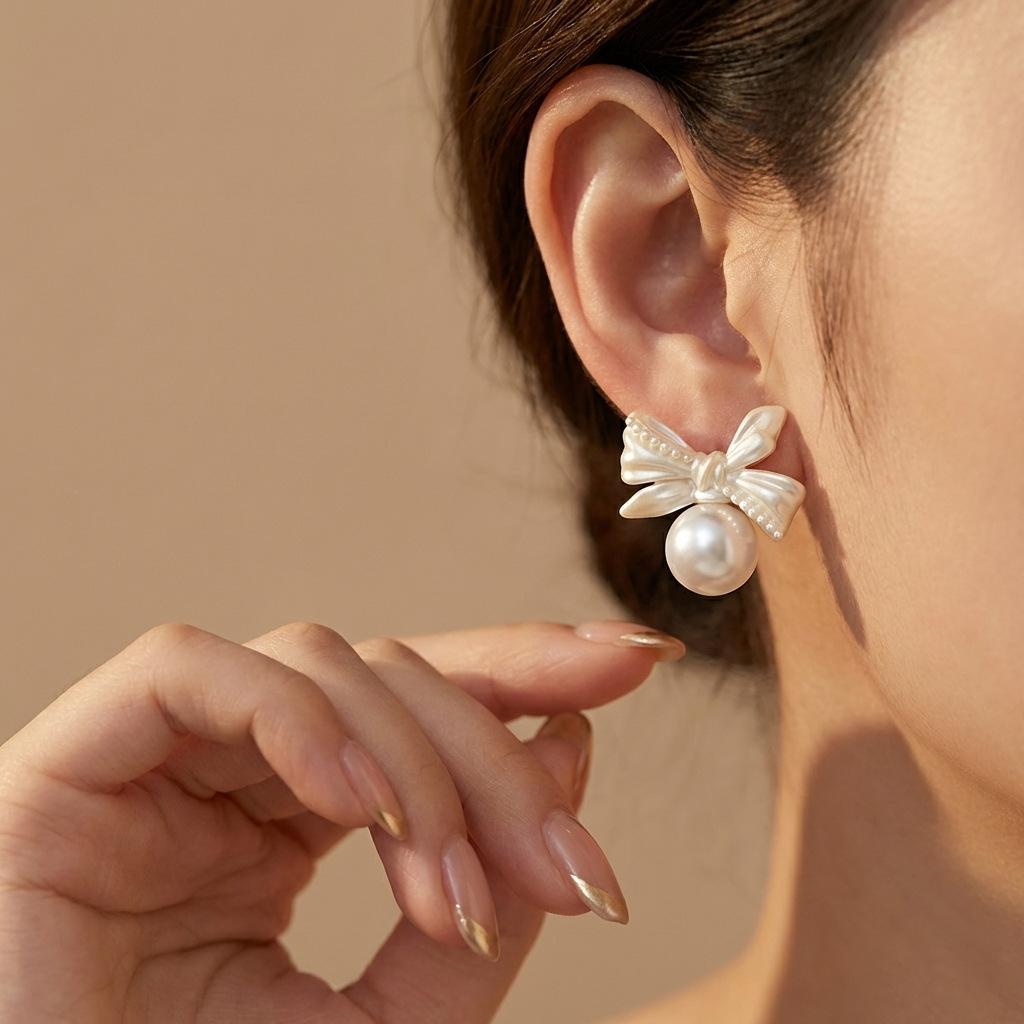 Gentle style mother-of-pearl butterfly bow earrings for women 9 Silver needle earrings offer a light luxury and sophisticated feel, suitable for