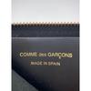 Used COMME des GARCONS L-shaped zipper coin case in excellent condition