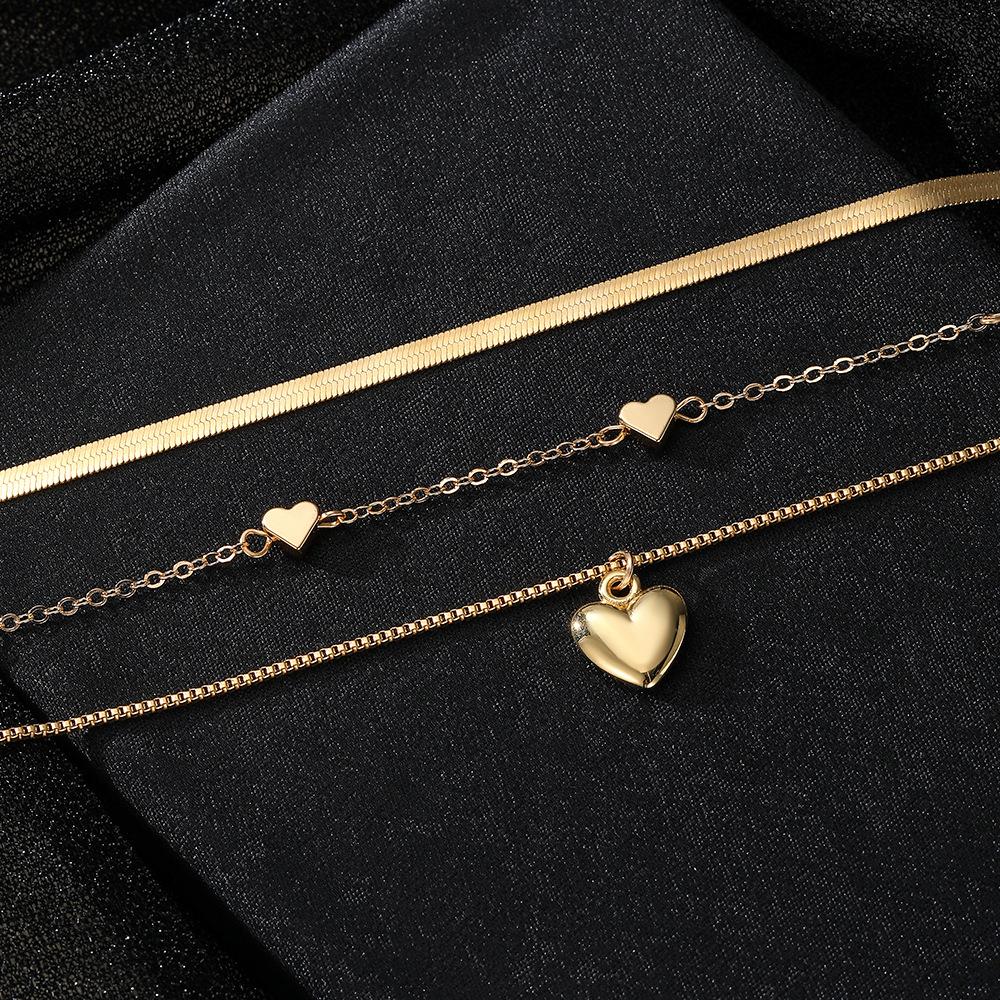 Heart-shaped pendant snake bone chain multi-layered necklace for women European and American-style, understated luxury, niche, vintage clavicle chain
