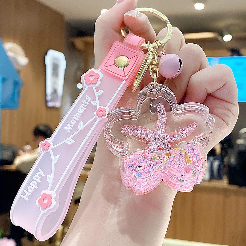 Starfish Quicksand Oil Keychain: Exquisite Pendant for Women's Bags, Students, and Kids - Cute Floating Schoolbag Decoration