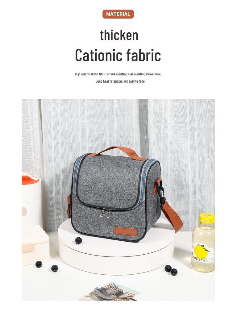 Izolowana torba na lunch crossbody: Gruba folia aluminiowa dla przedłużonej świeżości i zachowania zimna.