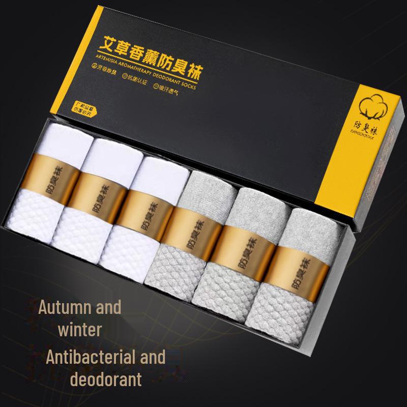 Men's Mid-Tube Socks with Wormwood Aromatherapy, Antibacterial, Breathable, Sweat-Absorbent, and Massaging Bottom for Autumn/Winter.