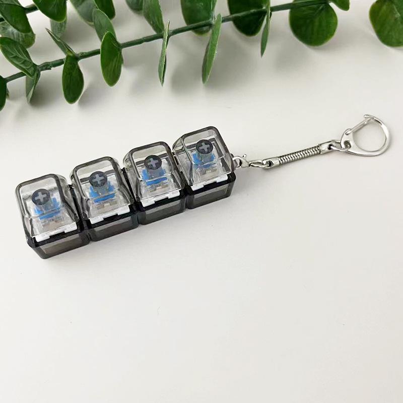 Transparent 4-Key Decompression Keychain with Light and Sound Effects