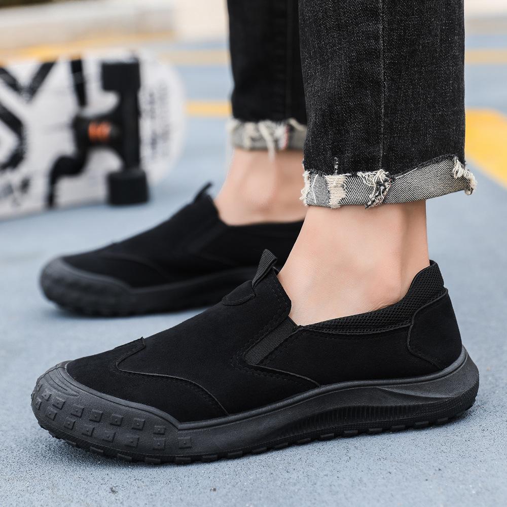 Herrskor 2025 nya vår- och sommar andningsbara canvas sneakers med en pedal mode avslappnad trend mångsidiga herrskor