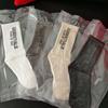 Vacuum-Packed Essentials: Trendy Unisex Mid-Tube Socks for Autumn and Winter