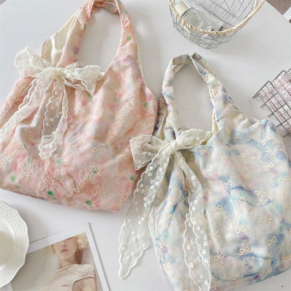 

High value smudge bow gentle niche handbag shoulder underarm bag tote bag рожевий