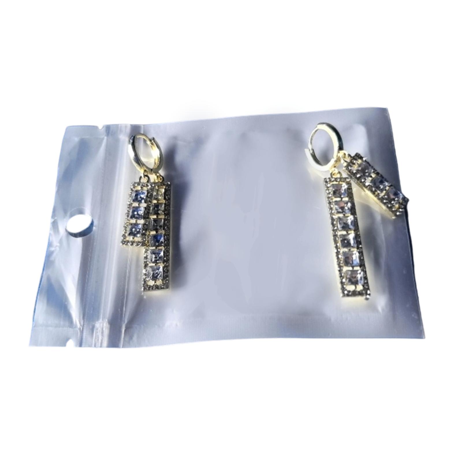 

Серьги-кисточки с геометрическим цирконием