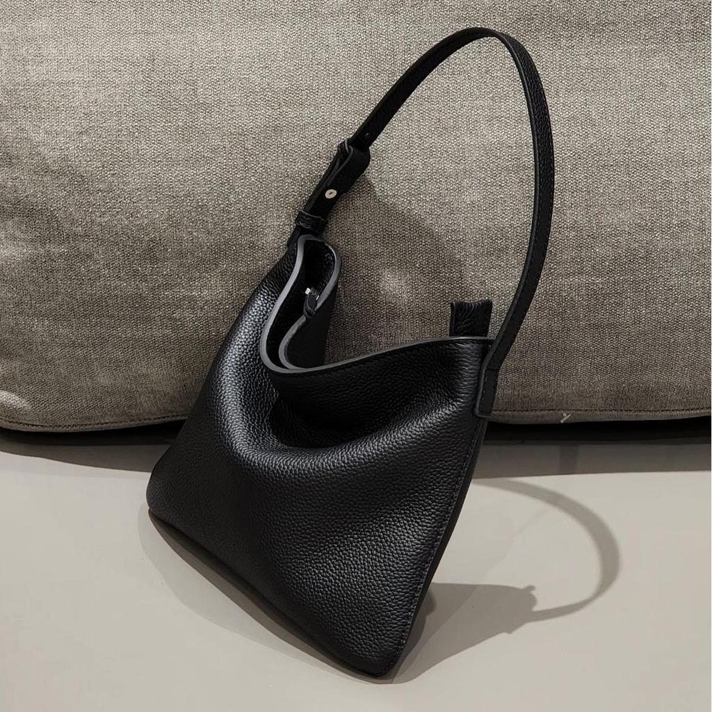 Borsa a secchiello casual in pelle bovina di primo strato, borsa tote minimalista di alta gamma, borsa in pelle versatile leggera e alla moda a spalla singola o diagonale