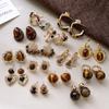 Melanoid Tiger Eye Heart Stud Earrings - Luxurious Fashion Jewelry Design