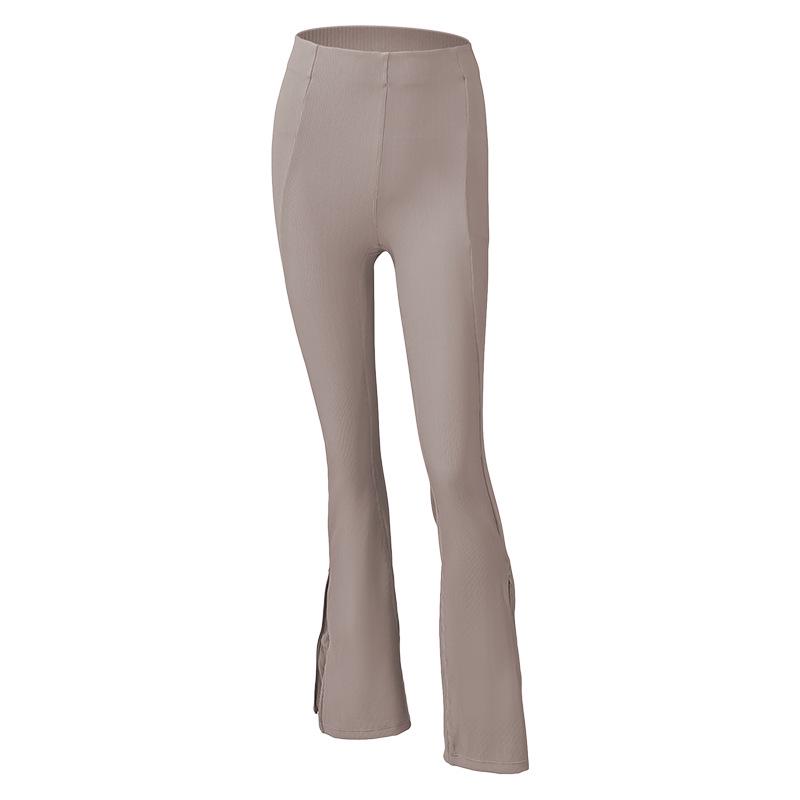 Dámské žebrované kalhoty na jógu s vysokým pasem a rozšířenými nohavicemi se zipem na lemu - Pohodlný a elastický střih