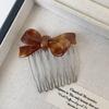 Bow Acetate Insert Comb: High-End Hair Clip for Women, Ideal for Taming Flyaways and Bangs.