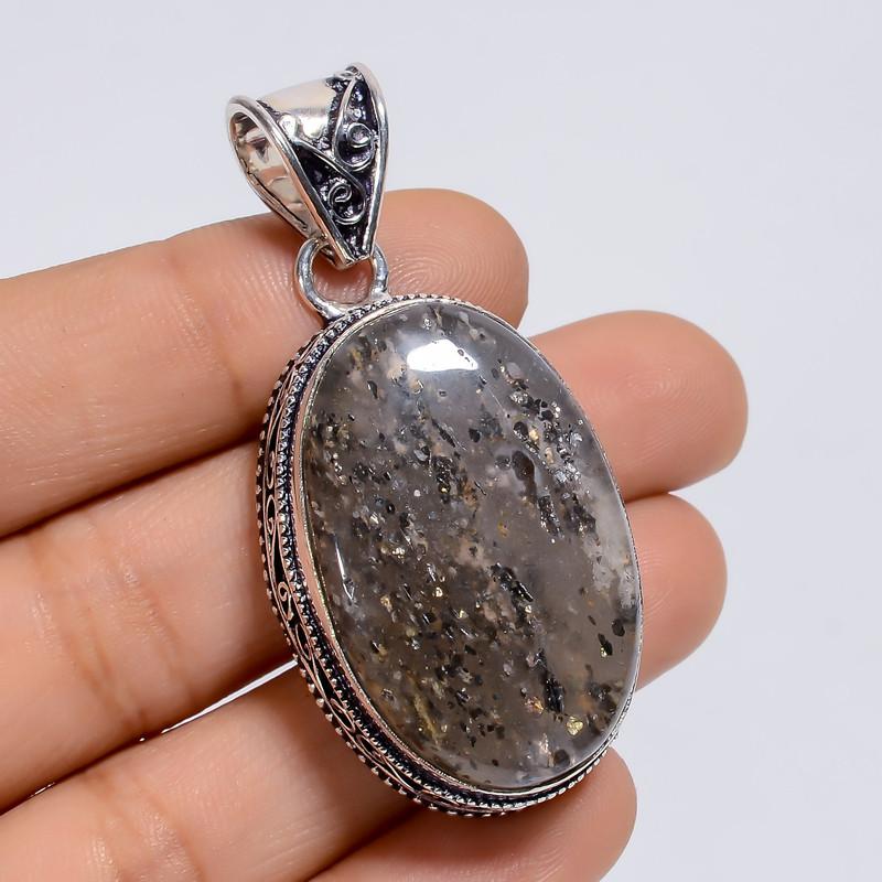 

Unisex Stainless Steel Pendant with Black Leather Cord and Modern Design 7-8