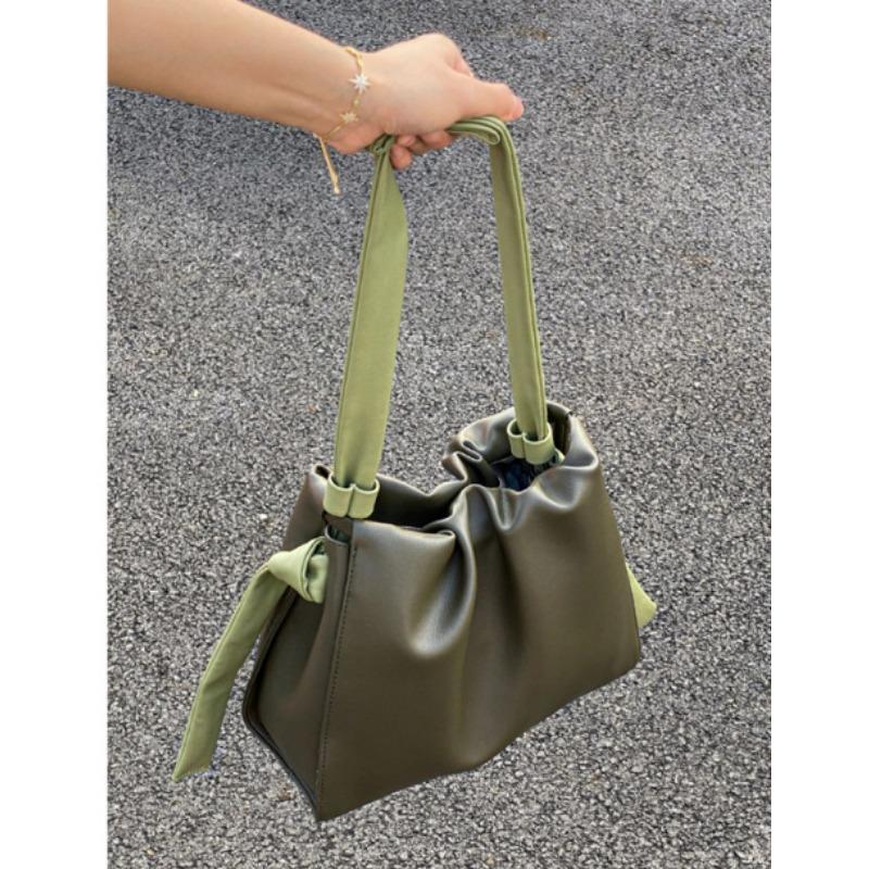 

Early spring pleated bag women s new niche fashion contrasting color shoulder crossbody cloud bag bucket bag women s bags зелений
