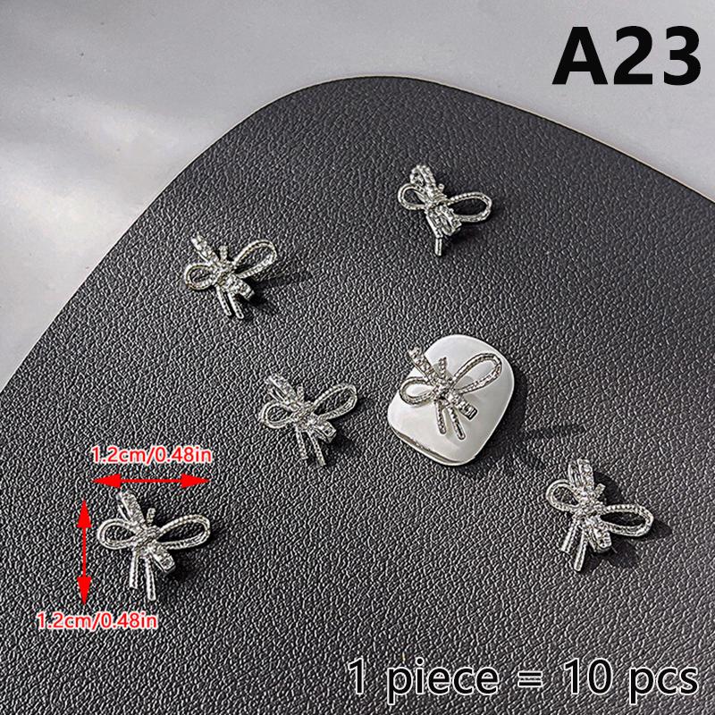 10 ks Jednoduché Tenké Mašličky Stříbrné Kroucené Slitiny Ozdoby na Nehty Manicura Přívěsky