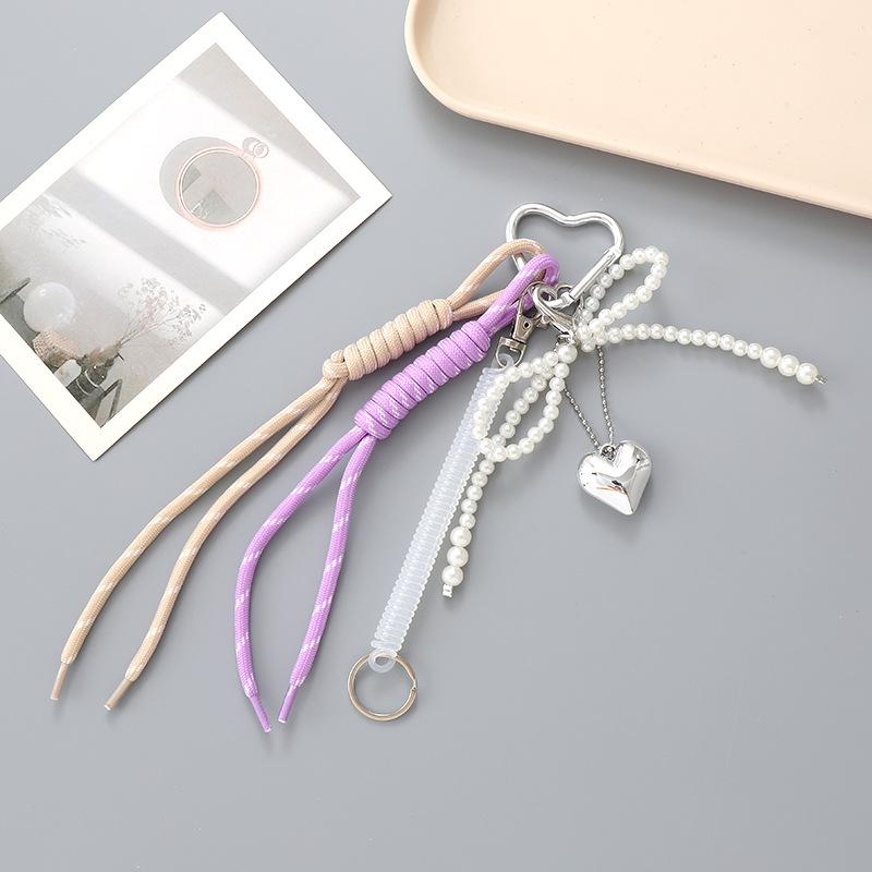 New Miu-style bag accessory with bow and heart keychain, personalized versatile woven rope phone charm Pendant