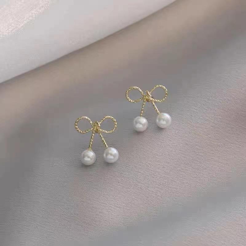 Bow pearl earrings new trendy high-end sense light luxury temperament earrings niche design stud earrings