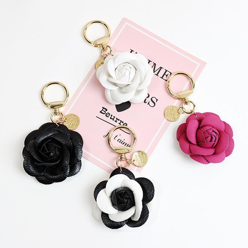 Yogodlns Cute Sweet Synthetic PU Leather Rose Camellia Flowers Bag Pendant For Women Trinket Key Chains Ring Car Bag Charm