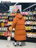 Real shot of the new winter mid-length knee-length down cotton coat for women, Korean-style loose thickened hooded cotton-padded jacket outerwear