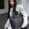 Oversized Bow Metal Rope Buckle Cowhide Woven Bag Women's Autumn and Winter New Leather Large-capacity Handbag