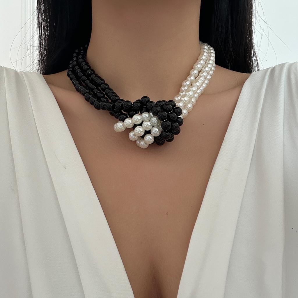 Multi-layer imitation pearl necklace European and American literary and retro black and white color matching jewelry women's collar