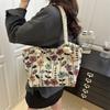 Large capacity national style cloth bag women's 2025 new commuter tote bag ins embroidered flower class shoulder bag