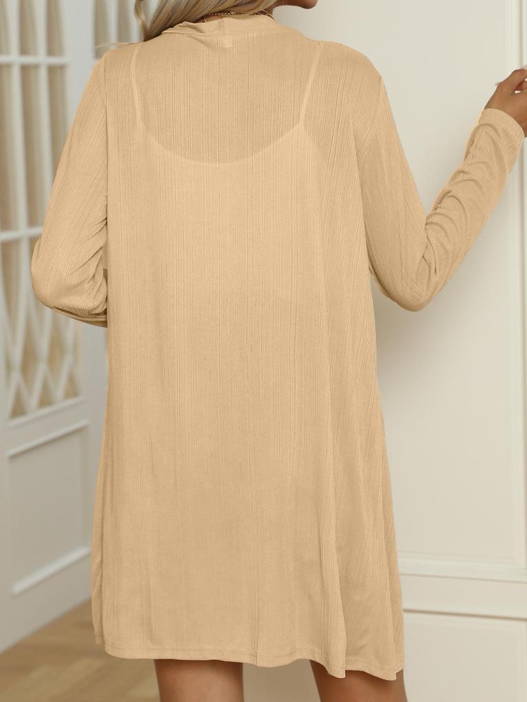 Damkofta med lång ärm och knappar i enfärgat - Höst/Vinterkollektion 2025