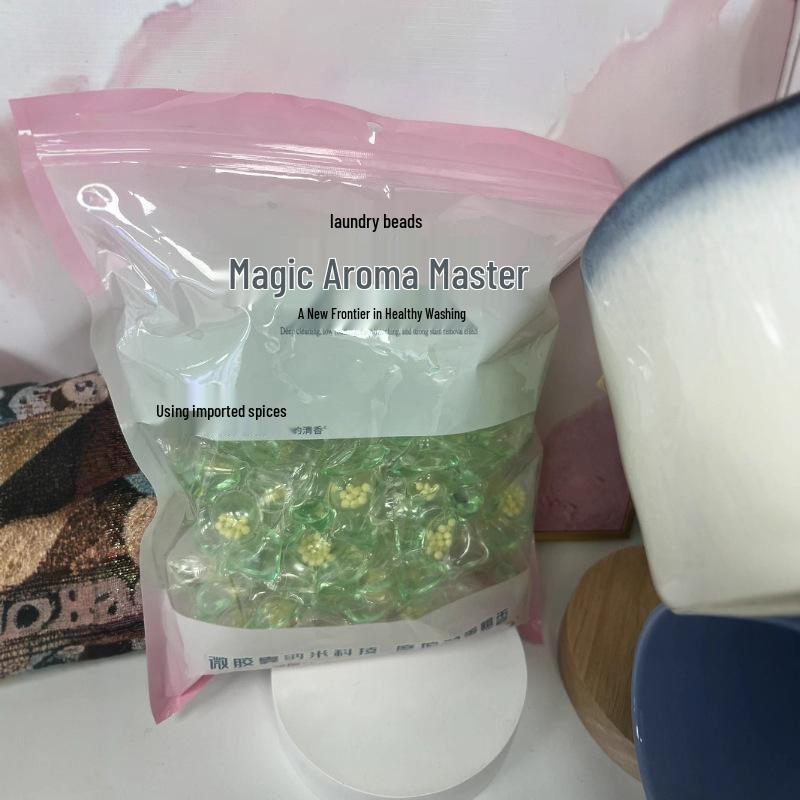 DM Camellia Scent Laundry Pods with Long-Lasting Fragrance, Stain Removal, and Softening Beads.