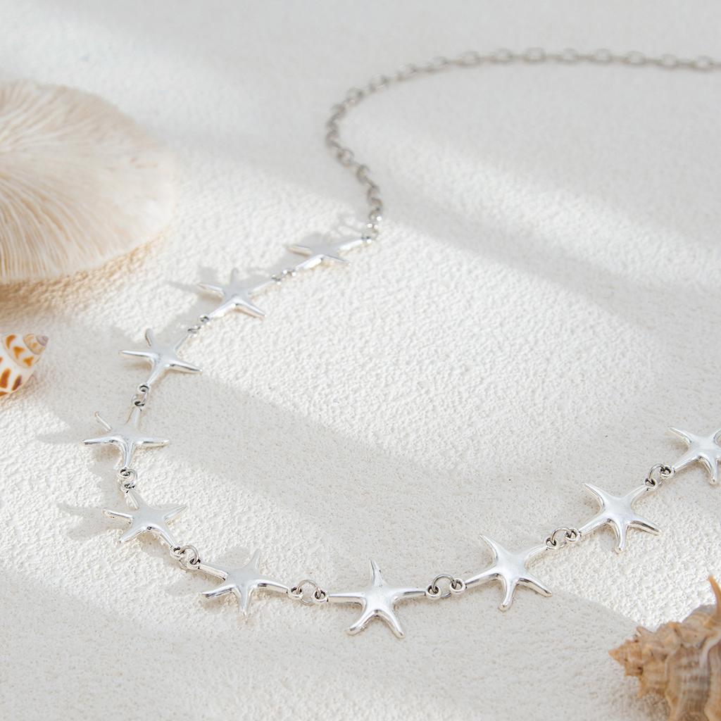 Étoile de mer en métal épissée Accessoires de taille sexy Mode Vent océan Vacances Chaîne de taille Tendance Cent tempérament Accessoires pour femmes