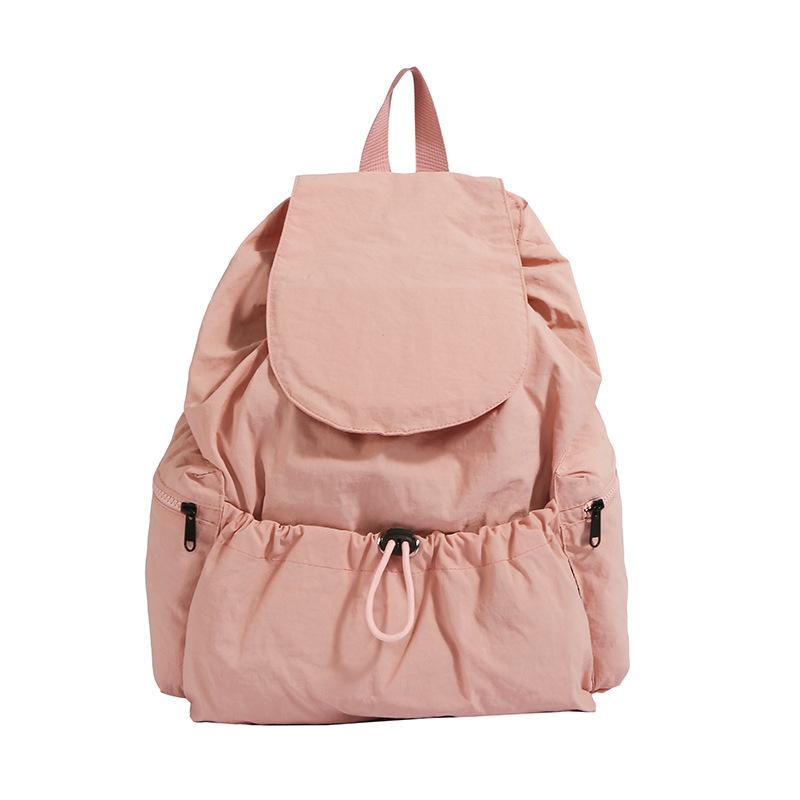 Korean version of fashionable nylon solid color schoolbag spring new versatile lightweight travel bag large capacity student bag women