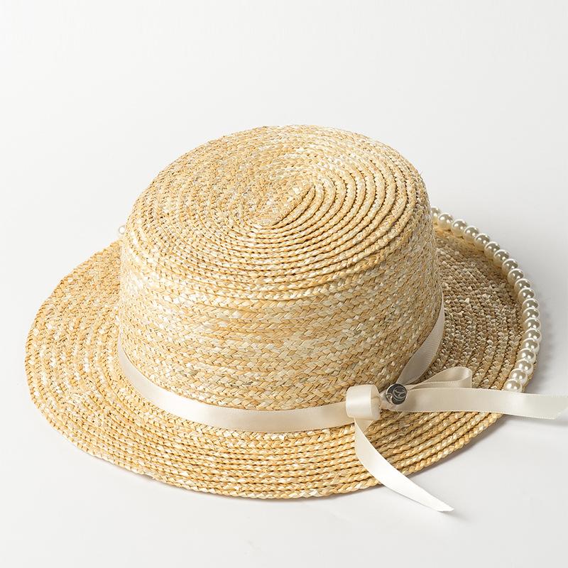 Spring and summer new parent-child pearl bow straw straw flat top top hat outdoor travel sunshade flat top straw hat