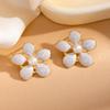 Fashionable Titanium Steel Pearl Flower Stud Earrings for Women: Stylish Stainless Steel Hollow Design in Cold Style.