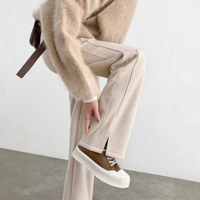 Pantaloni in Lana a Gamba Larga a Spina di Pesce con Spacco per Donna - Collezione Primavera/Estate 2025