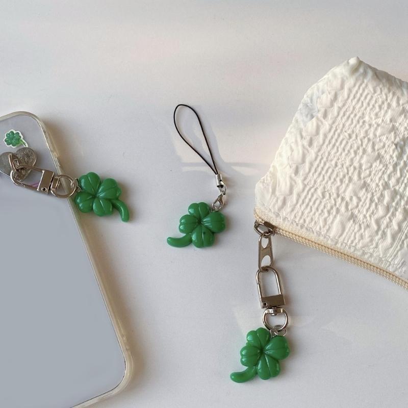 Grünes vierblättriges Kleeblatt Handy-Anhänger-Riemen Auto-Schlüsselanhänger Anhänger Mode-Taschen-Dekoration Lanyard Geldbörsen-Zubehör