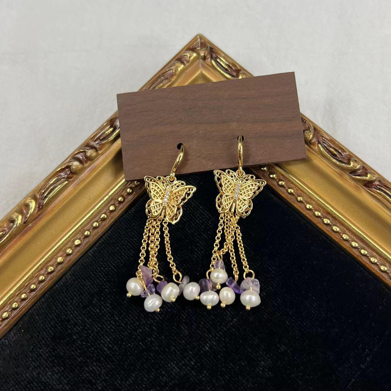 

Hollow 3D Butterfly Pearl Tassel Purple Earrings: Fashionable, Versatile Autumn/Winter Women s Jewelry