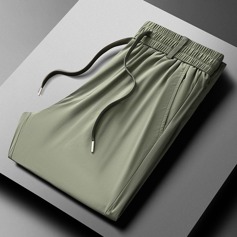 

Мужские летние брюки из эластичного ледяного шелка больших размеров, молодежные повседневные спортивные брюки 5XL зелёный