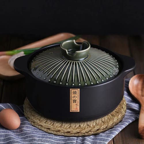 Stylish straw pot mat, heat-resistant, with hooks, perfect for iron kettles, pots, earthenware pots, and other ironware. A simple, decorative accessor