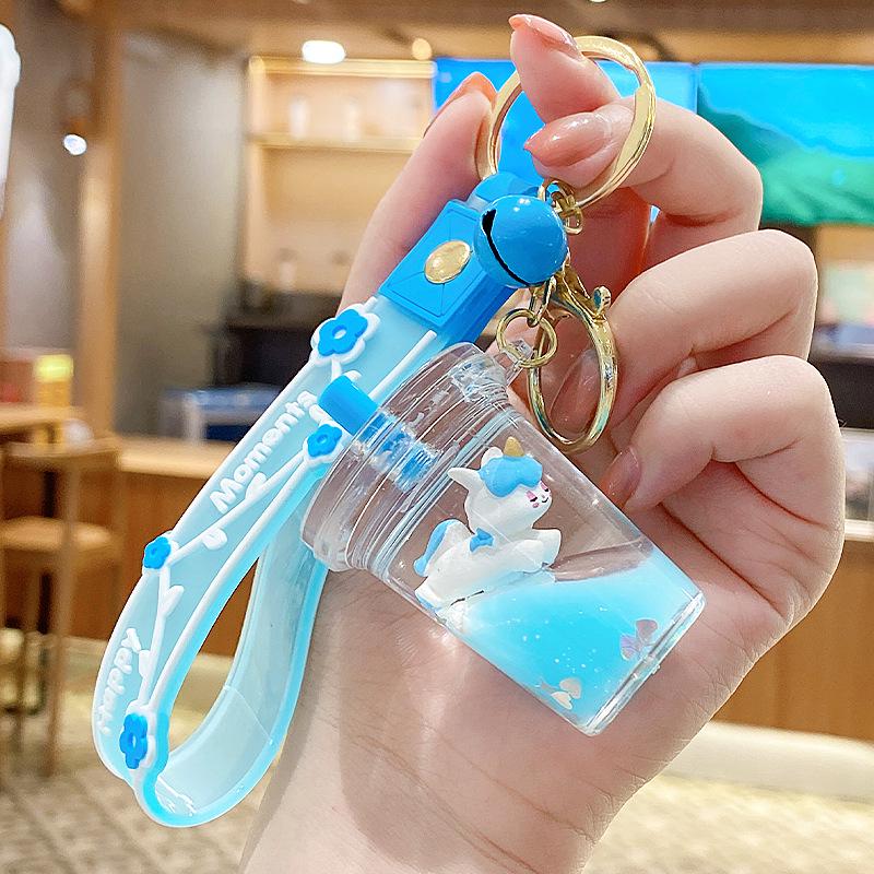 Lila Stern Flüssiger Treibsand Schlüsselanhänger mit Kirschblüten Öl-gefülltem Anhänger - Niedlicher 3D Rucksackanhänger für Frauen