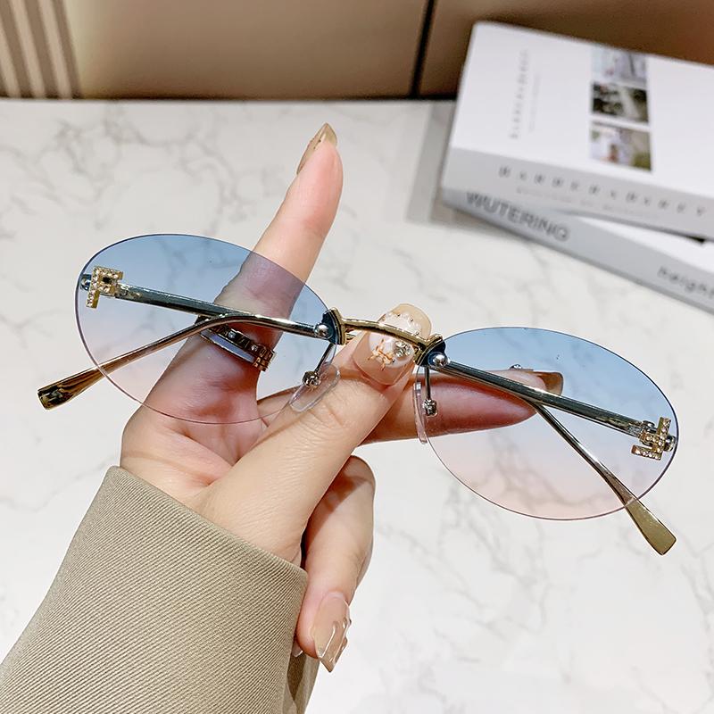 Protective Glasses Fashion Oval Rimless Design sun glasses Female Small Size Metal Suneyeglass Outdoors Casual Vacation UV400