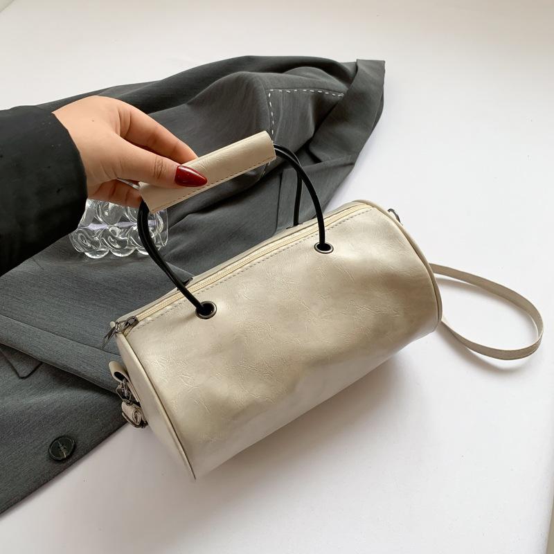 

Ретро повседневная сумка-цилиндр 2025 весна новая в иностранном стиле модная сумка-мессенджер трендовый повседневный дизайн сумка через плечо белый