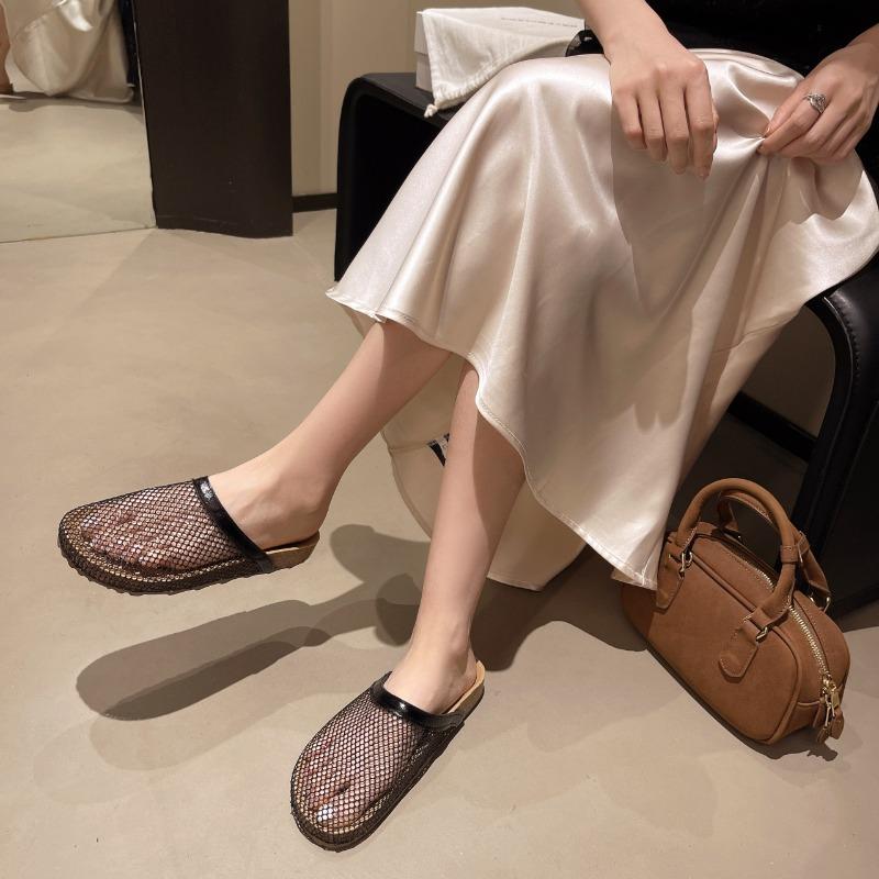 Casual hollow fishing net bag head half slippers women summer wear new beach cool slippers women 40 чёрный 3100₽