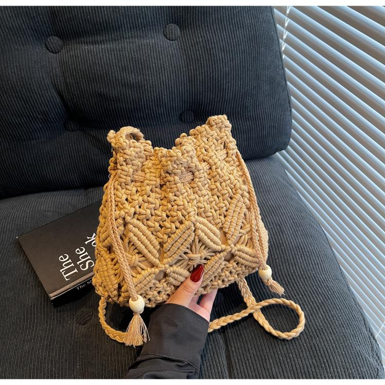 Seaside vacation wind rope woven bag women's 2025 spring and summer new beach bag crossbody bucket bag woven bag