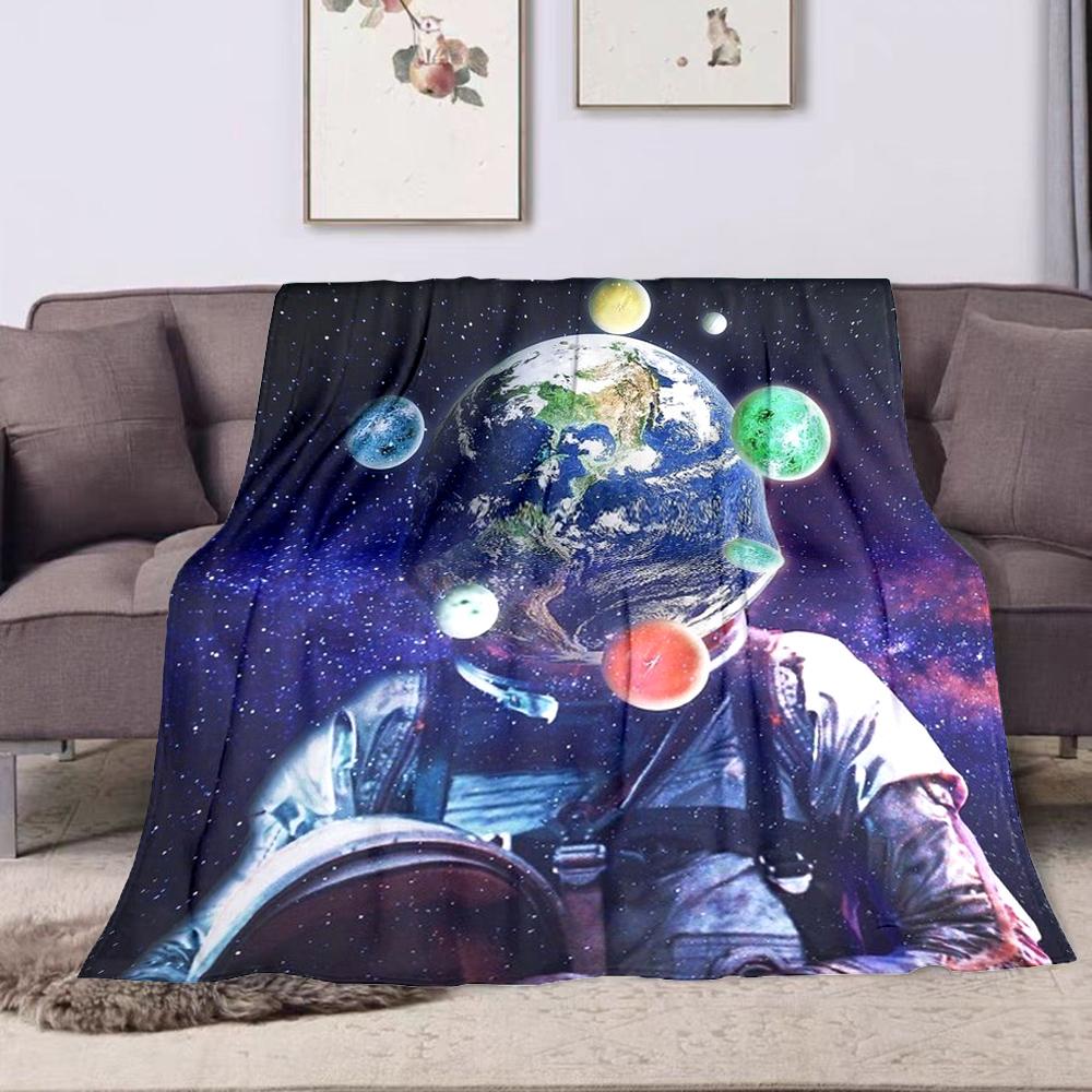 Astronaut with Planet Head in Space Patterned flannel blanket perfect for the bedroom living room, sofa, or a little nap