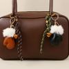 Süßer Taschenanhänger Schlüsselanhänger Glöckchen Handschuhe Geflochtenes Seil Schlüsselanhänger Taschenanhänger für Rucksack Handtasche Handtaschen-Dekoration