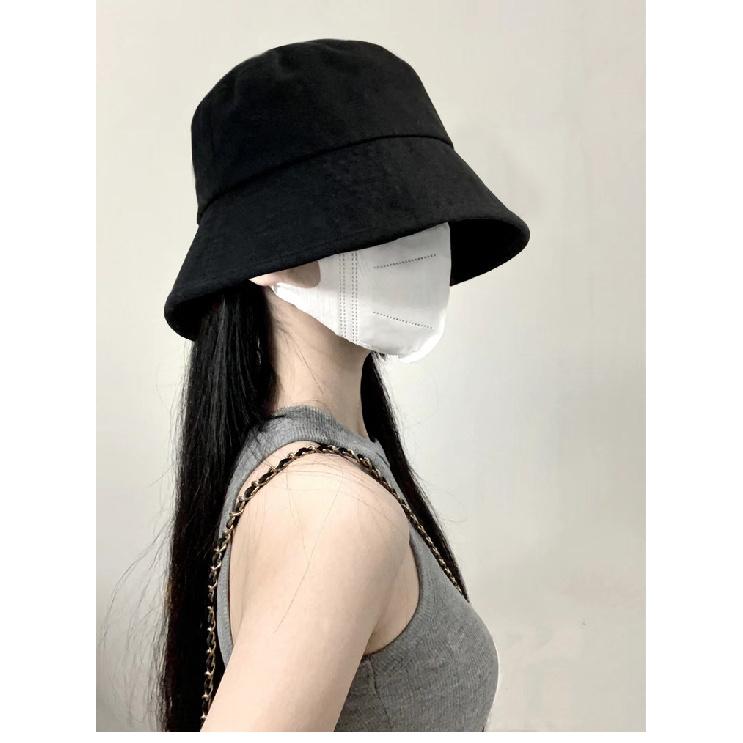 Black fisherman hat for women, oversized design, stylish and sun-protective, bucket hat