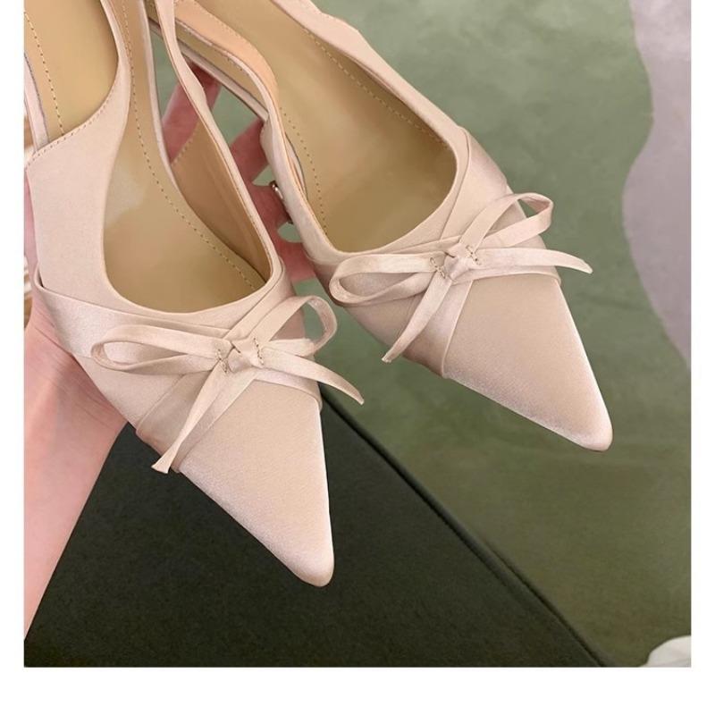 

Туфли-лодочки на высоком каблуке с острым носком и открытой пяткой 40 абрикосовый